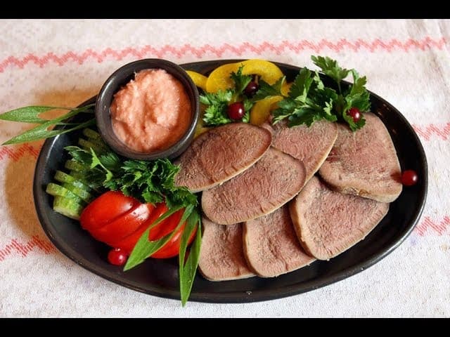 Persian-Style Braised Beef Tongue with Mushroom Sauce (Khorak-e Zaban)